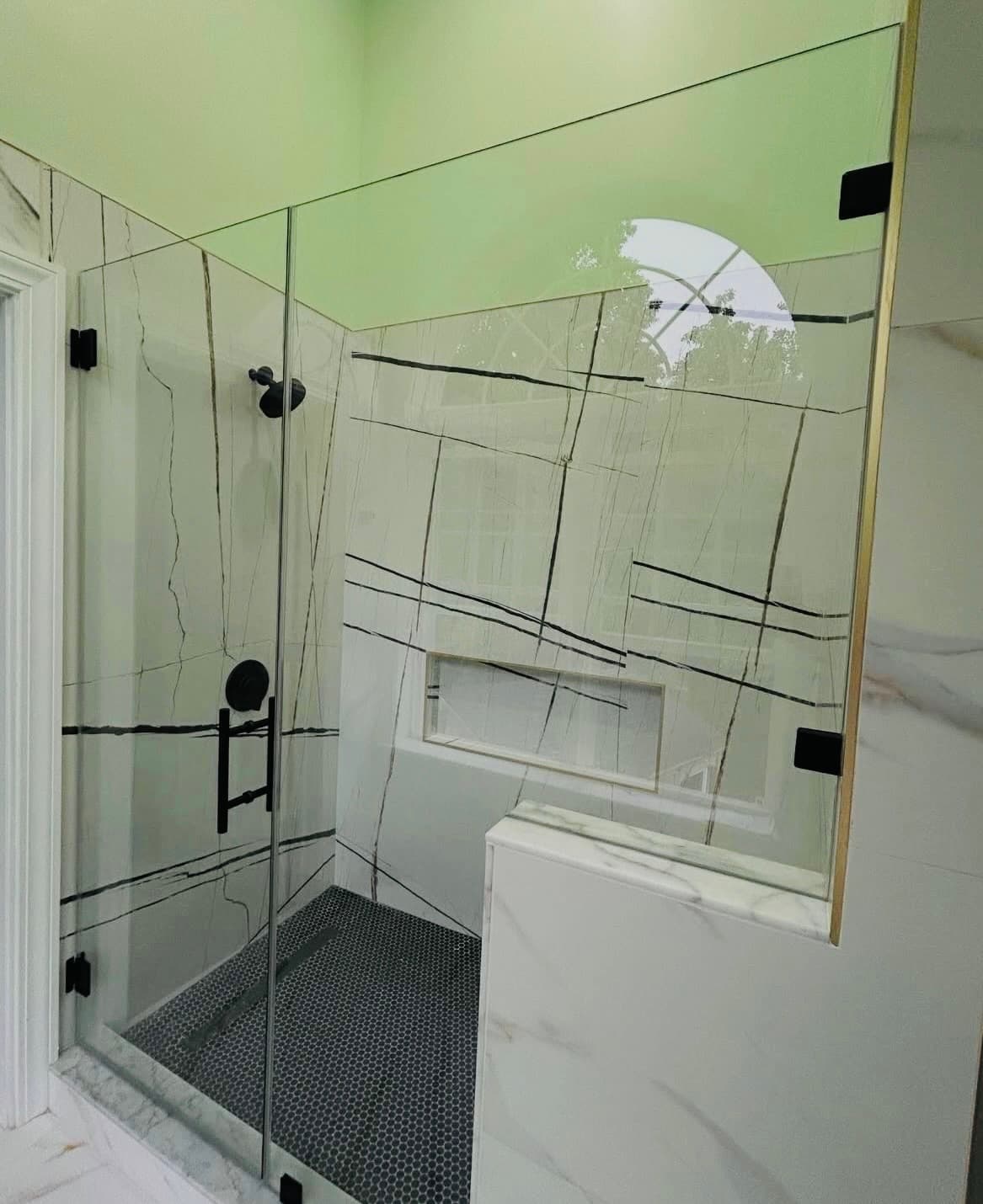 Custom frameless shower with matte black hardware, Haverhill area installation style